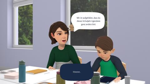 Animiertes Standbild aus dem Spiel "Was ist los mit Jaron?": Jaron sitzt betrübt neben seiner Lehrerin am Tisch, diese spricht in an: "Mir ist aufgefallen, dass Du dieses Schuljahr irgendwie ganz anders bist." Jaron erwiedert:"Hmmm."