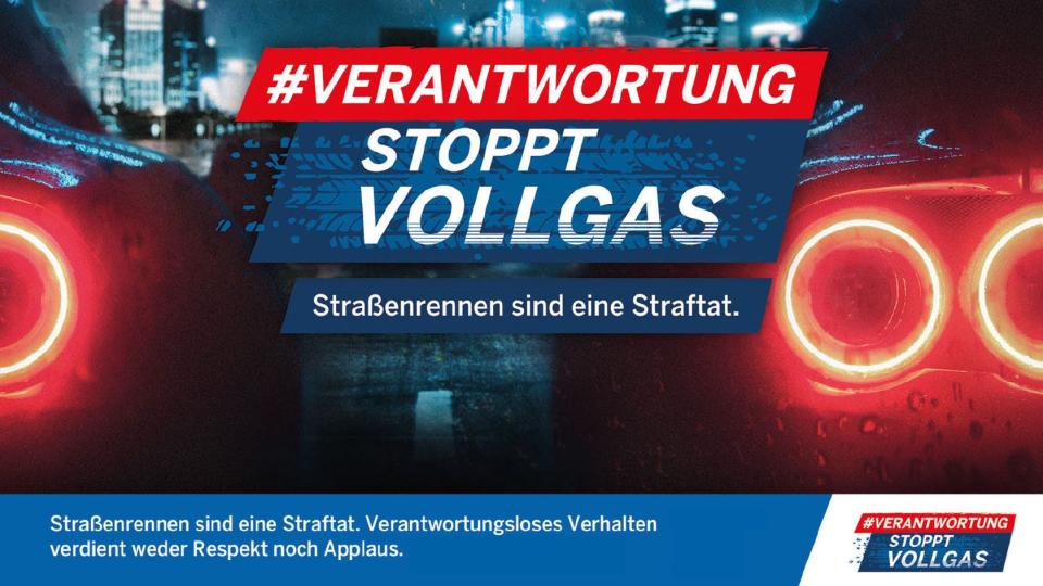 Das Poster zur Kampagne "Verantwortung stoppt Vollgas" zeigt zwei Sportwagen mit roten Bremsleuchten in einer regnerischen Nacht. Das Poster zur Kampagne "Verantwortung stoppt Vollgas" zeigt zwei Sportwagen mit roten Bremsleuchten in einer regnerischen Nacht.
