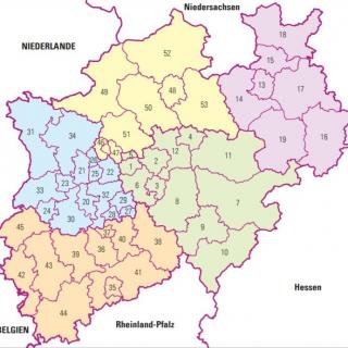 Karte Nordrheinwestfalens, auf der die fünf Regierungsbezirke eingezeichnet sind.